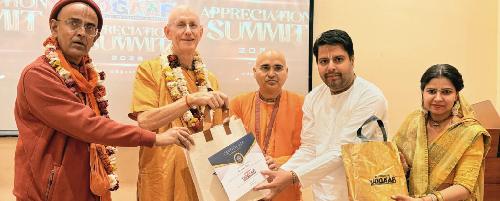 Giriraj Baker's Recieving Award for serving Satvik Food